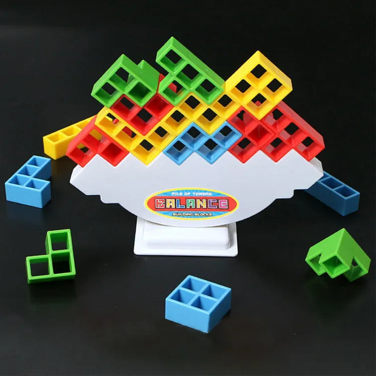 Plastic balance stacking game with colourful building blocks on 26.5cm square chassis