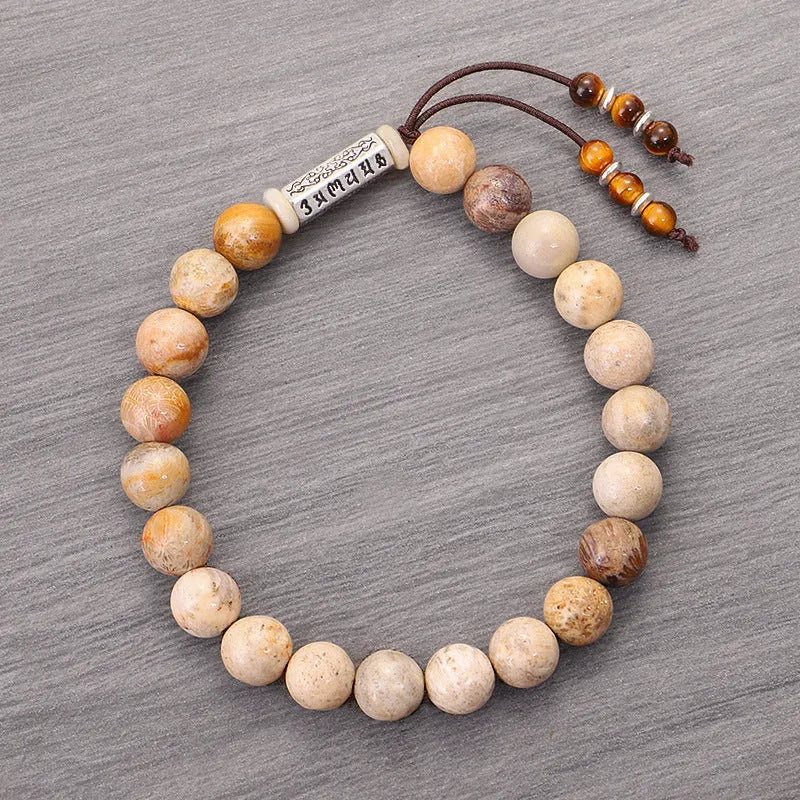 Wood colour stone bead bracelet with handmade construction on wrist