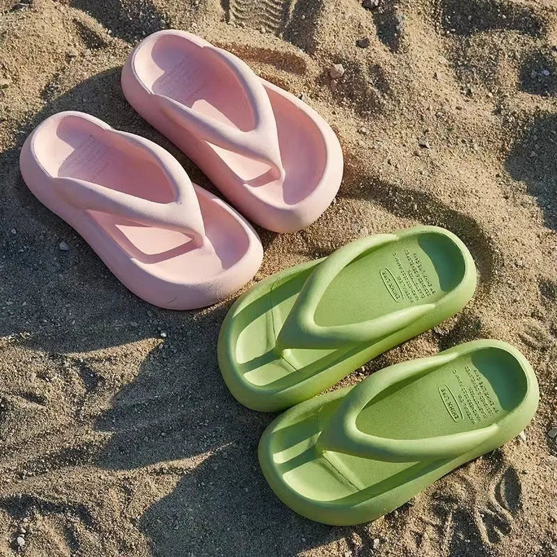 Solid colour thick-soled EVA flip-flops with a bow detail on the upper.