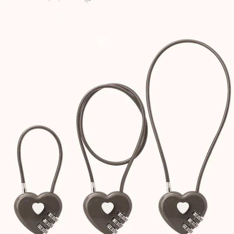 Peach heart-shaped ABS plastic love lock with a steel rope, shown in various colours.