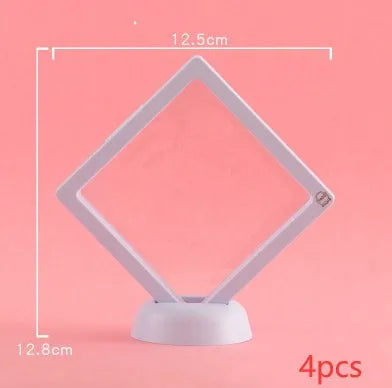 Transparent 3D floating display case holding a coin, with black and white size options