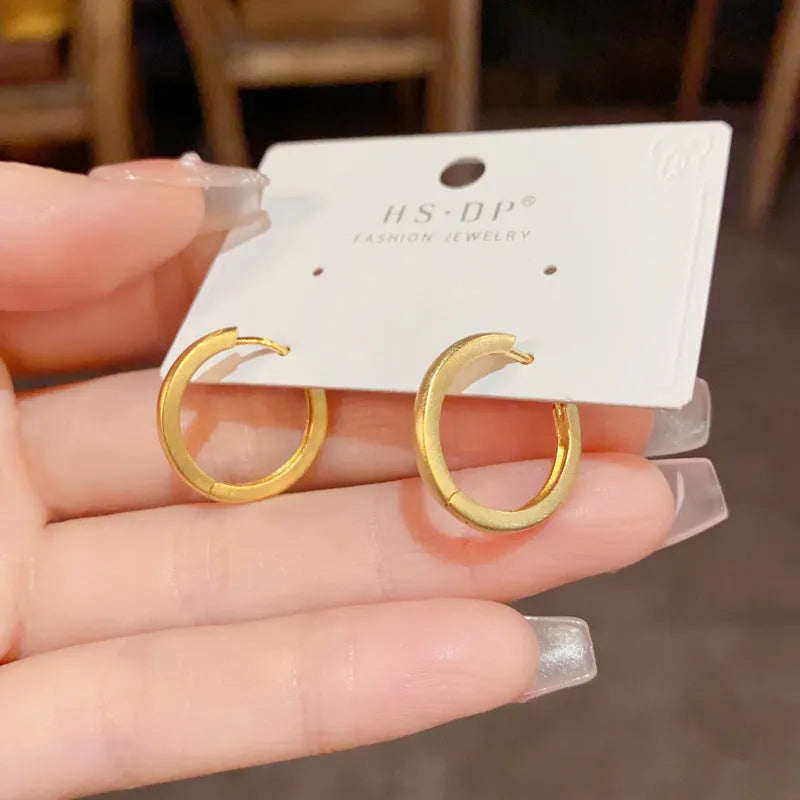 Geometric circle ear clips for women in gold or silver colour with real gold plating