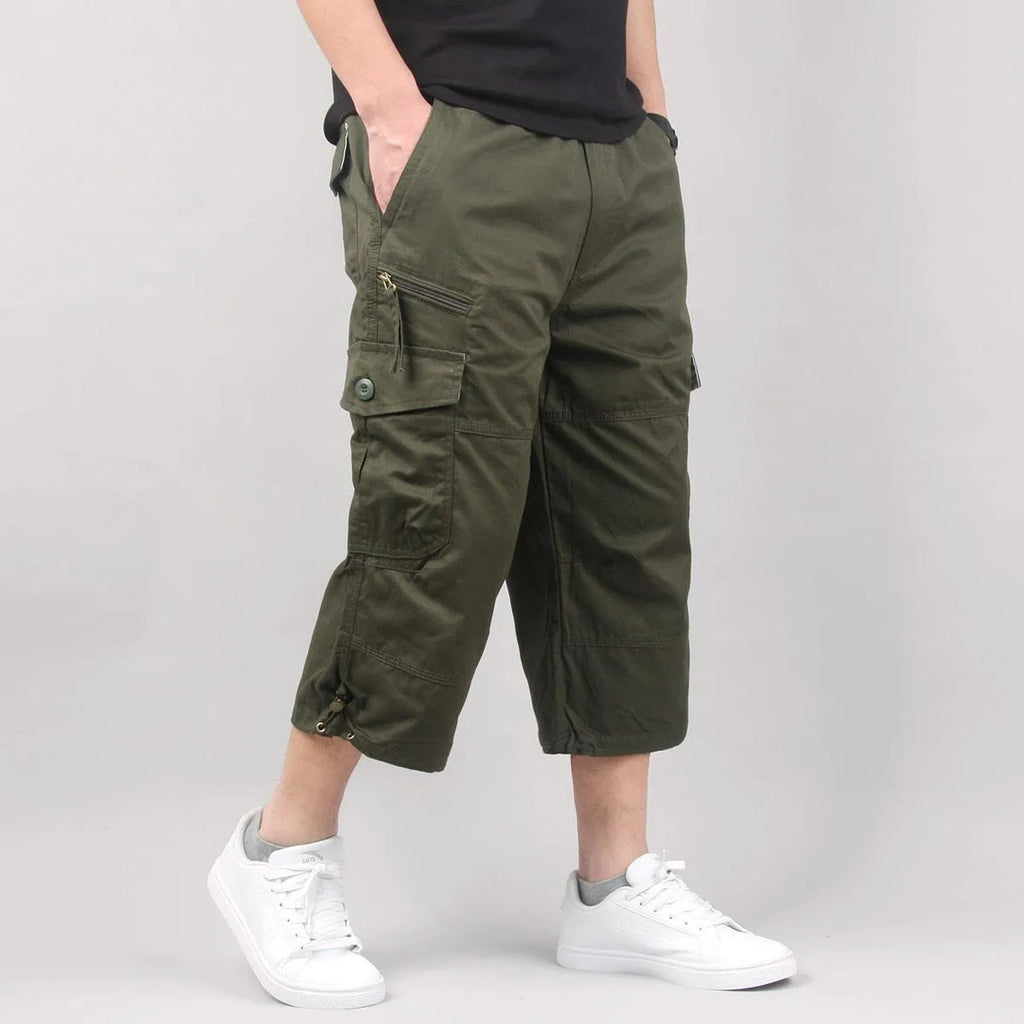 Men's cropped cotton sports pants in khaki, loose cropped length, front view