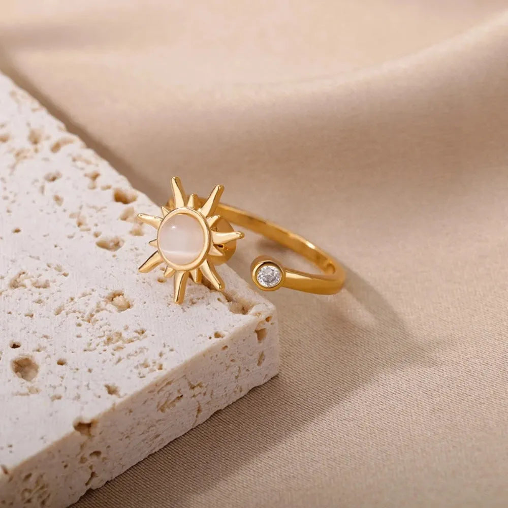 Simple geometric decompression ring with adjustable opening in gold electroplated finish