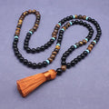 Geometric agate jewellery set with black bracelet and tiger-eye necklace