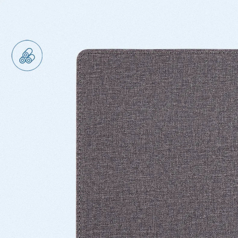 Wireless charging mouse pad with phone holder in four colour options on a desk