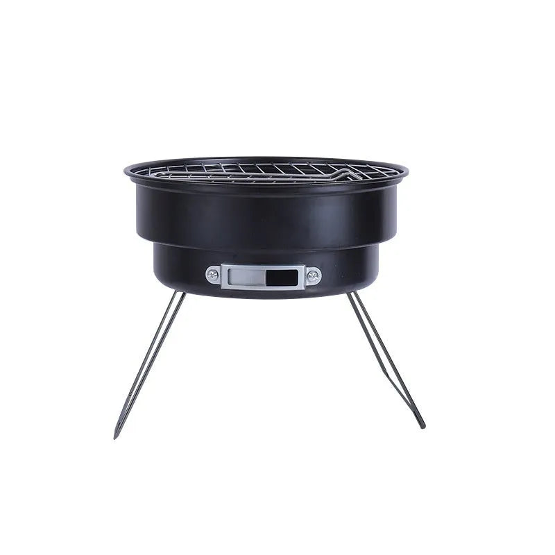 Small round folding ice stove with grill, leg, clip, and storage bag for portable outdoor cooking.