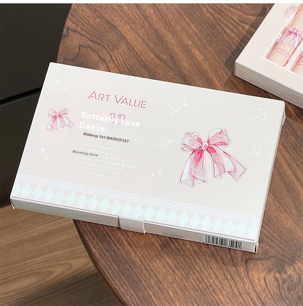 Butterfly Box makeup set showing lip mud containers, powder blusher compact, and necklace accessory with pink packaging