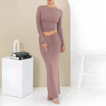 Women's black polyester two-piece autumn suit with sweet style, three-quarter sleeves, and long skirt.
