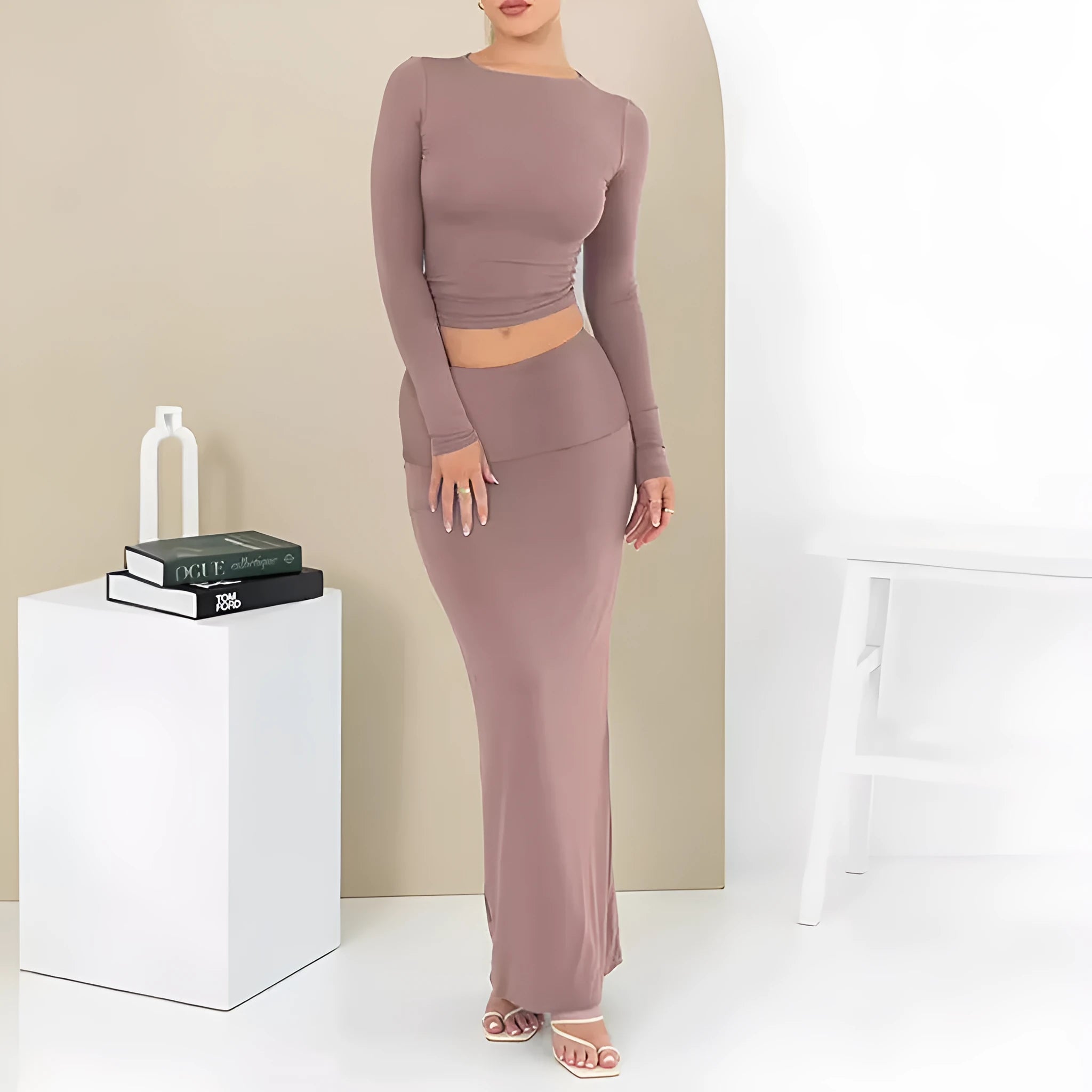 Women's black polyester two-piece autumn suit with sweet style, three-quarter sleeves, and long skirt.