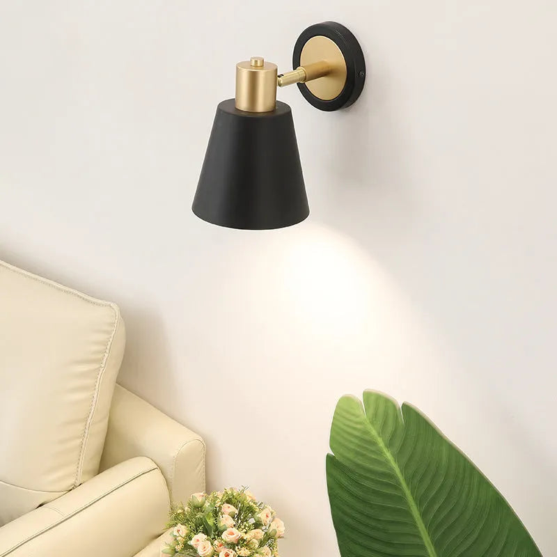 Nordic style iron wall lamp in a choice of four designs for bedside or living room wall mounting.