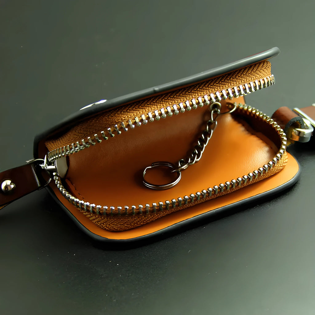 Genuine leather car key case with zipper closure and frosted finish in black or brown