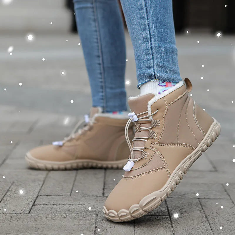 Outdoor snow boots in black with front lace-up, round toe, and a thick rubber sole.