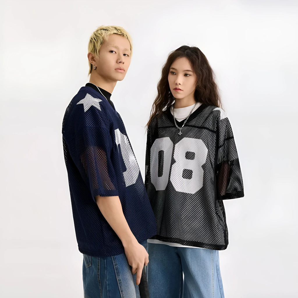 Loose fit black half sleeve pullover shirt with white letter pattern design on the front.
