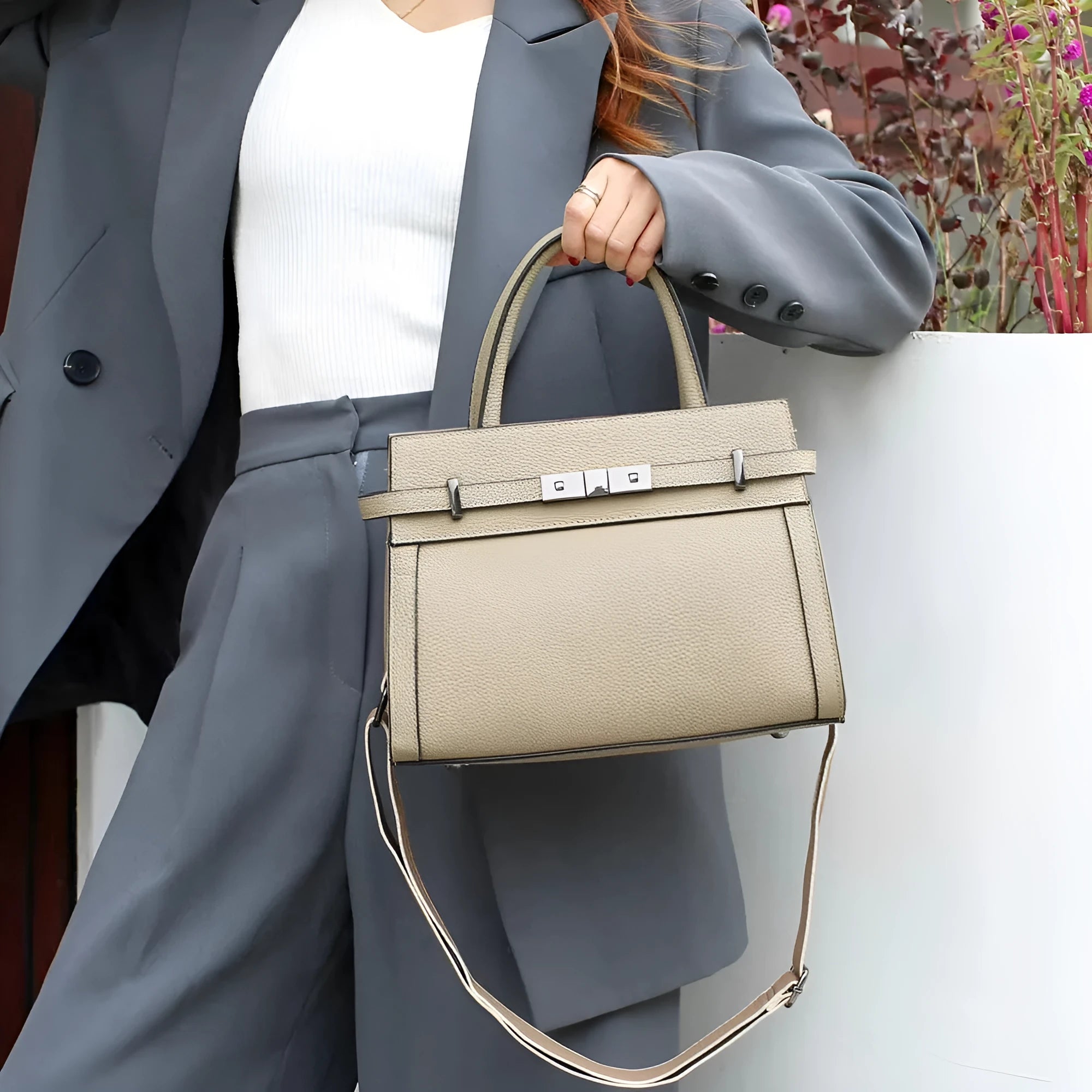 Genuine leather small square shoulder bag in almond green with internal organisation compartments