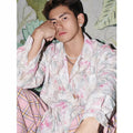 Embossed floral pattern long sleeve shirt in chemical fibre blend fabric available in pink and blue colours