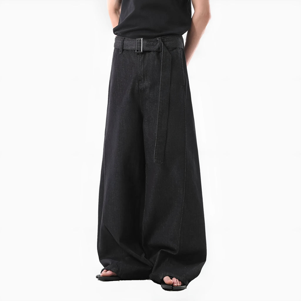 Black high-waist straight-leg jeans with a retro gold wash detail on a mannequin.