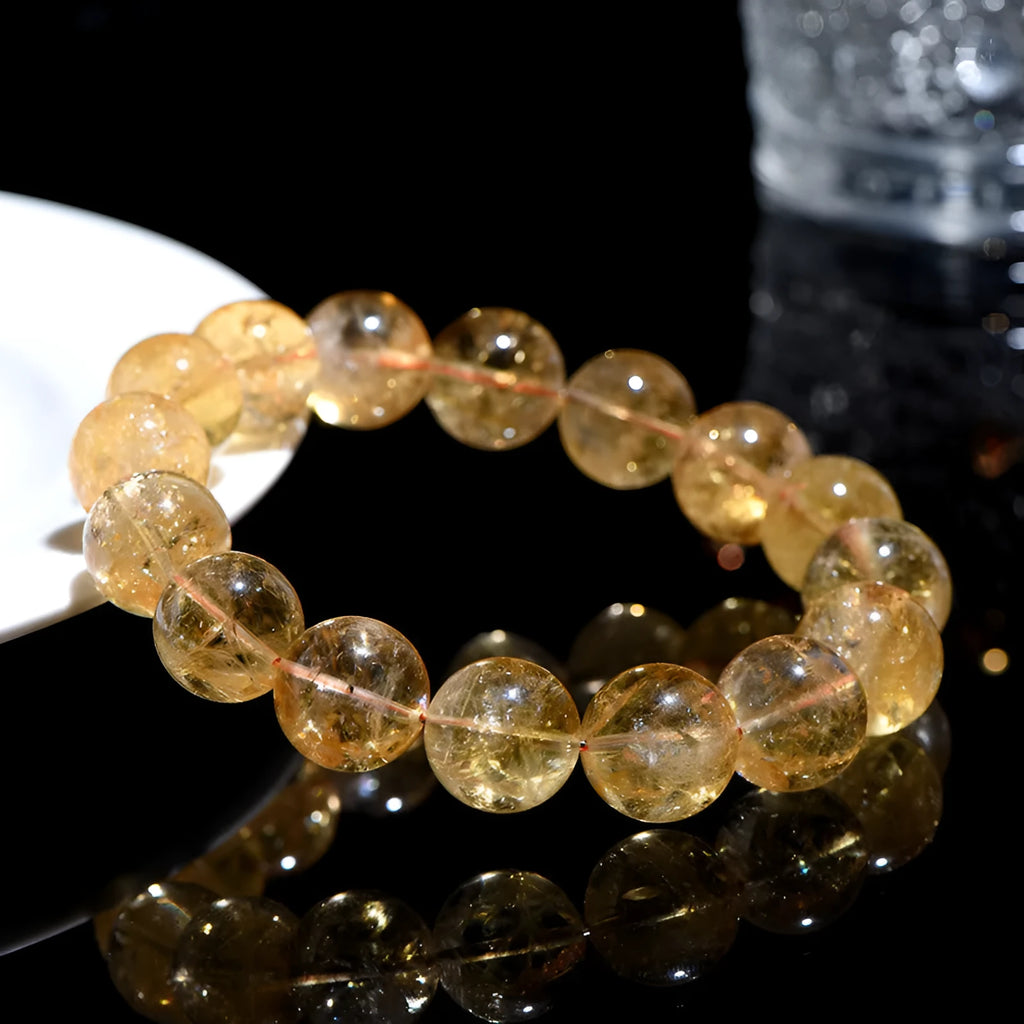 Natural yellow citrine bead bracelet showing options for single strand and triple strand styles.