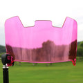 Close-up of multicolour rugby helmet goggles made from impact-resistant material, shown detached from a helmet.