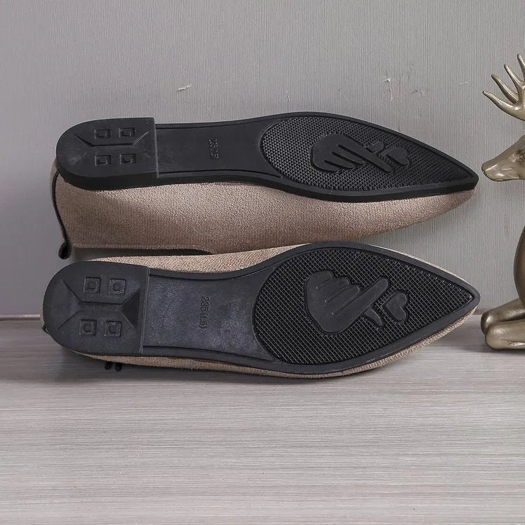 Beige leopard print women's plus size pointed toe pumps with a faux PU upper and rubber sole.