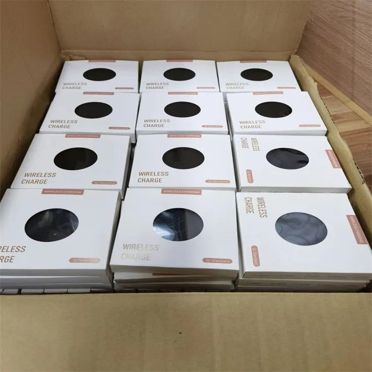 Black frosted 15W wireless charger for mobile phones with Type-C cable on a desk