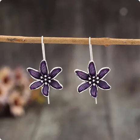 Purple flower-shaped alloy earrings with electroplated finish and retro styling