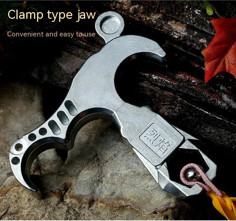 Close-up of a zinc alloy archery release aid showing the harpoon clip and trigger mechanism.