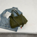 Polyester canvas shoulder bag in solid colour with internal mobile phone pocket organisation