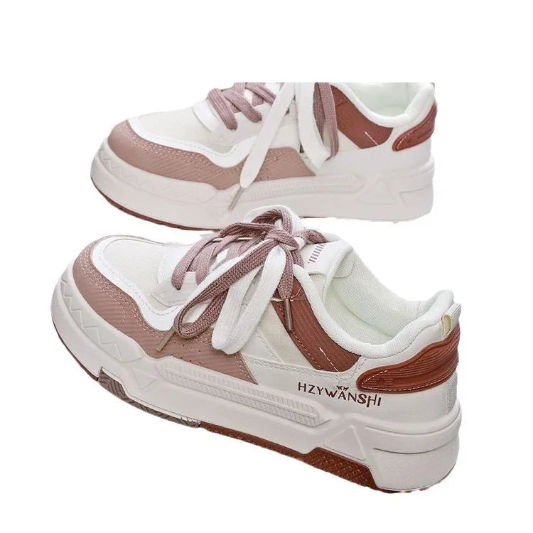 Children's beige height increasing trainers with thick rubber sole, lace-up front, and cross shoulder straps.
