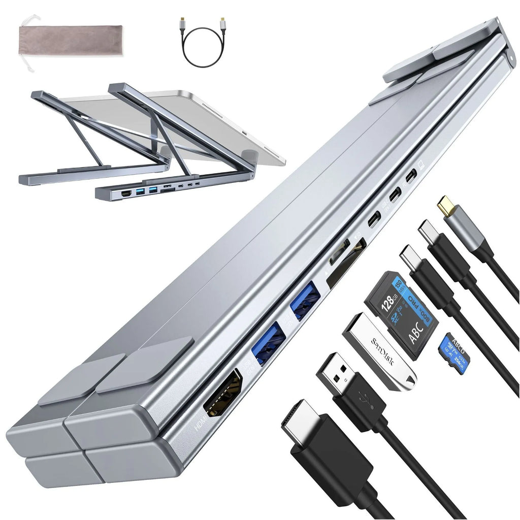 Silver aluminum alloy folding laptop stand with 8-in-1 HDMI docking station ports visible