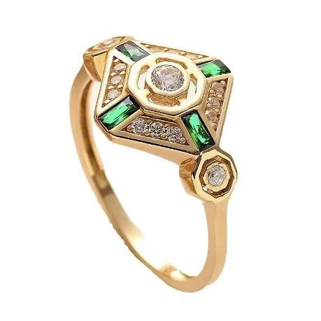 Square geometric women's ring with green diamond colour on a hand.