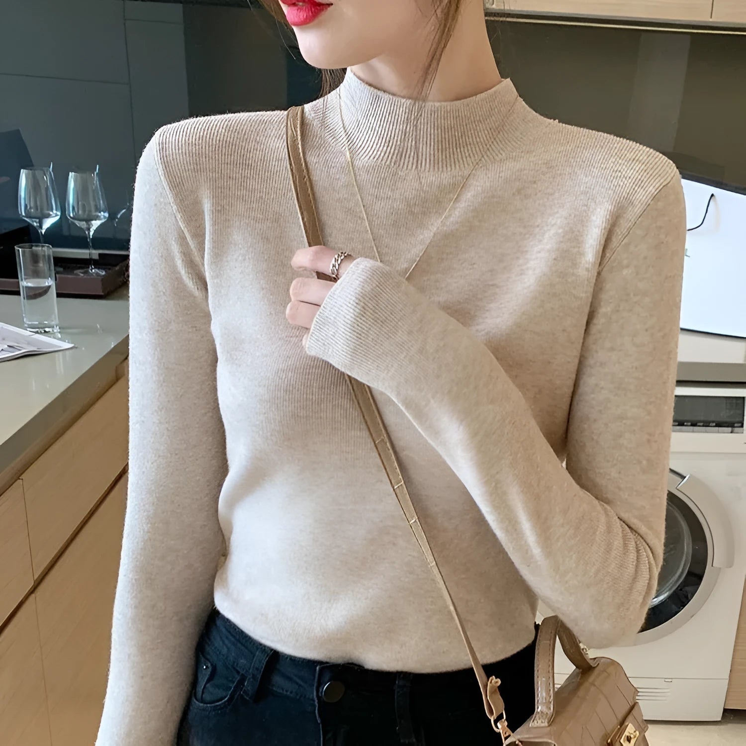 Slim fit viscose fibre knitted shirt with long sleeves in apricot colour showing front view