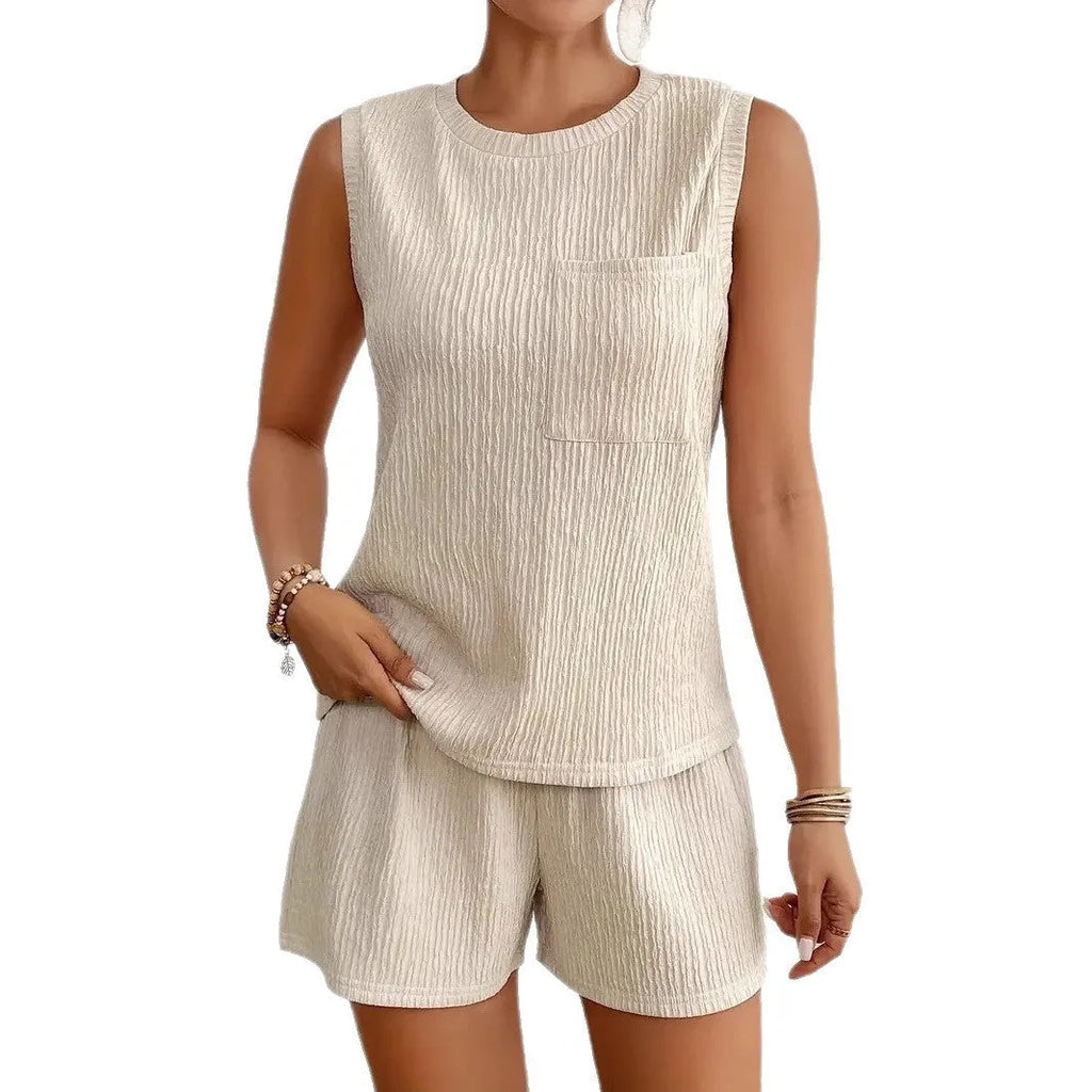 Women's apricot coloured sleeveless vest and shorts set on a hanger