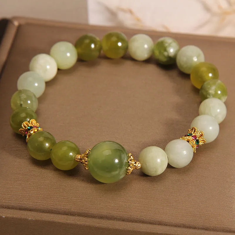Women's jade bracelet in Xiuyan green colour with original Mori style design