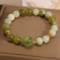 Women's jade bracelet in Xiuyan green colour with original Mori style design