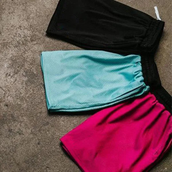 Man's black mesh quick-drying athletic shorts for summer running and fitness.