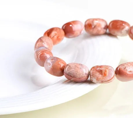 Natural cherry blossom agate barrel bead bracelet with ruyi pattern design