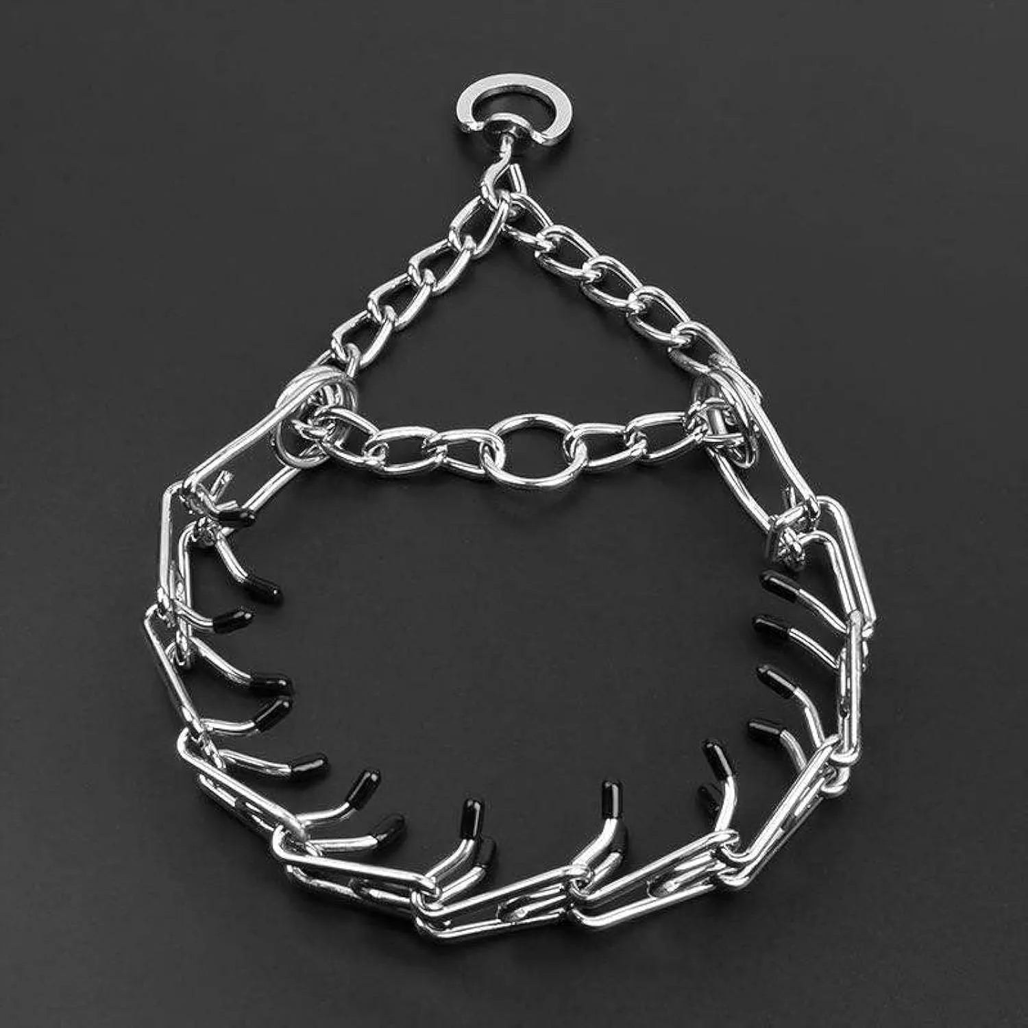 Stainless steel dog prong training collar with rubber tips on adjustable metal links.