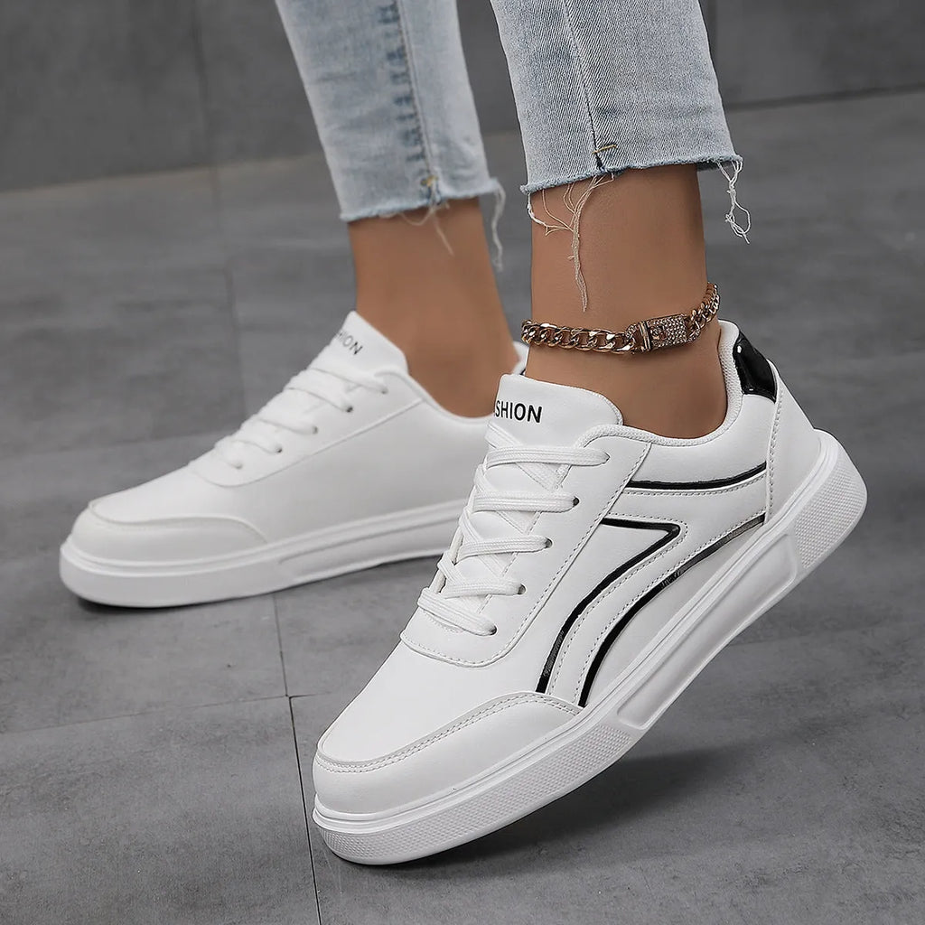 Plus size female board shoes with breathable mesh upper and rubber sole in solid colour low top style