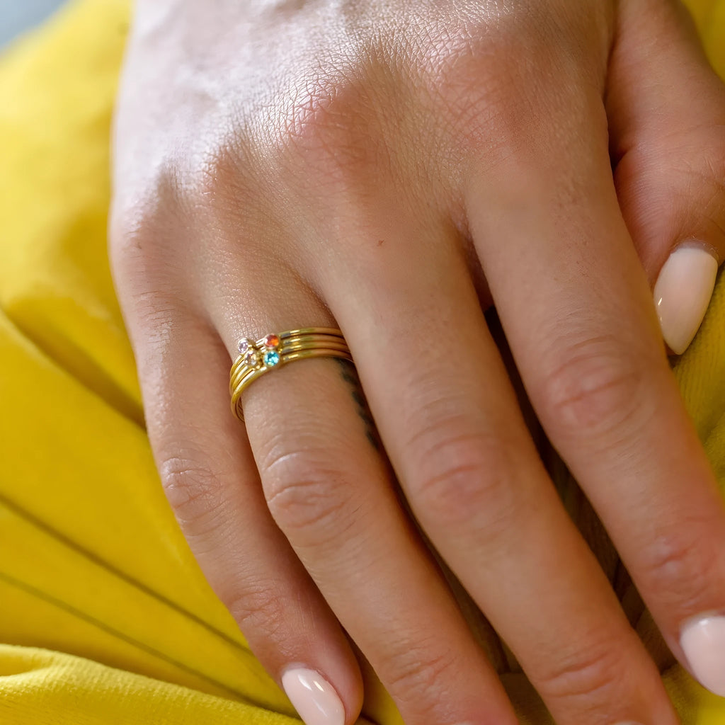 December birthstone engraved titanium steel ring with geometric design in gold and steel tones