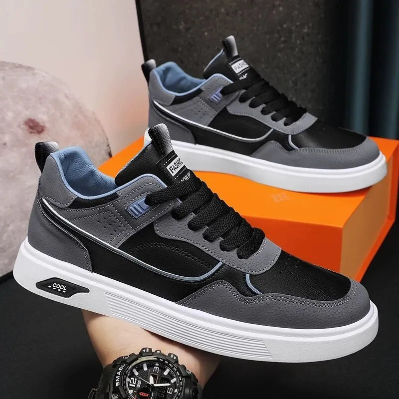 Men's low-top canvas board shoes in black with leather stitching and a mesh lining.