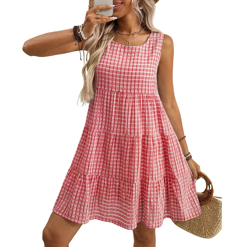 Women's light blue sleeveless plaid dress with a high waist and full swing skirt.