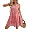 Women's light blue sleeveless plaid dress with a high waist and full swing skirt.