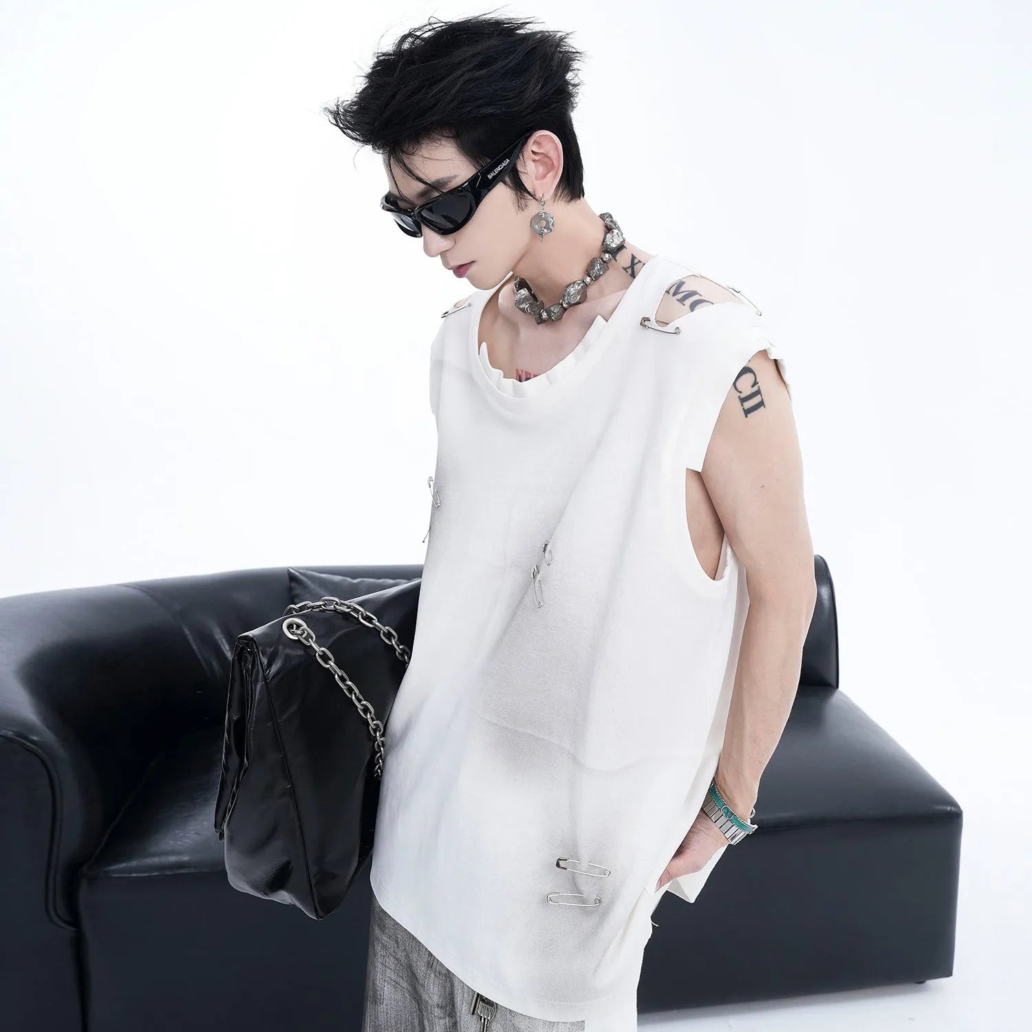 Men's black sleeveless vest with irregular cutting piece design and round neck collar