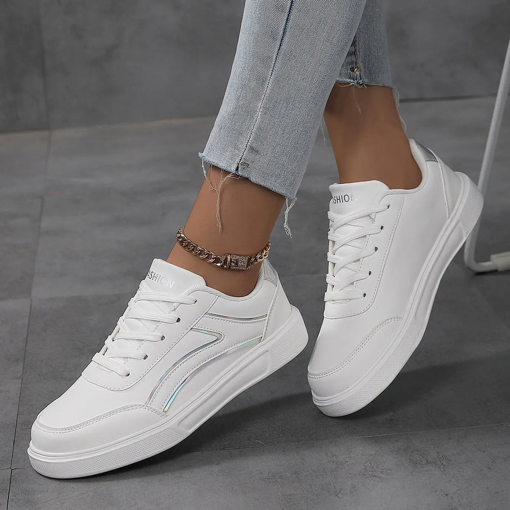 Plus size female board shoes with breathable mesh upper and rubber sole in solid colour low top style