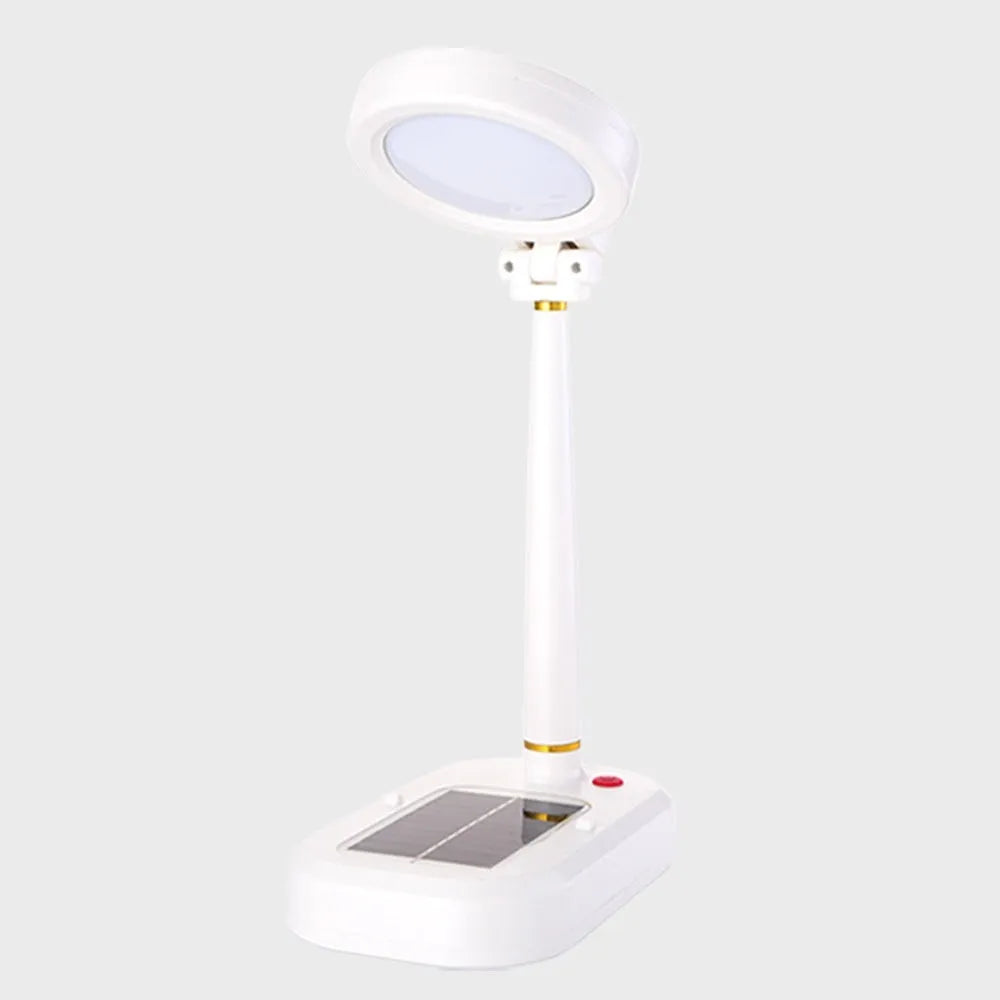 Ivory white solar-powered table fan with integrated LED study lamp on desk