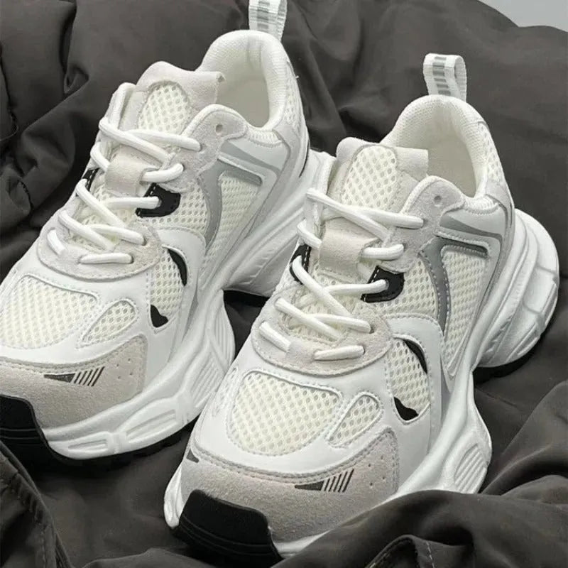Beige mesh platform sports shoes with wedge heel and front lace-up closure on rubber sole