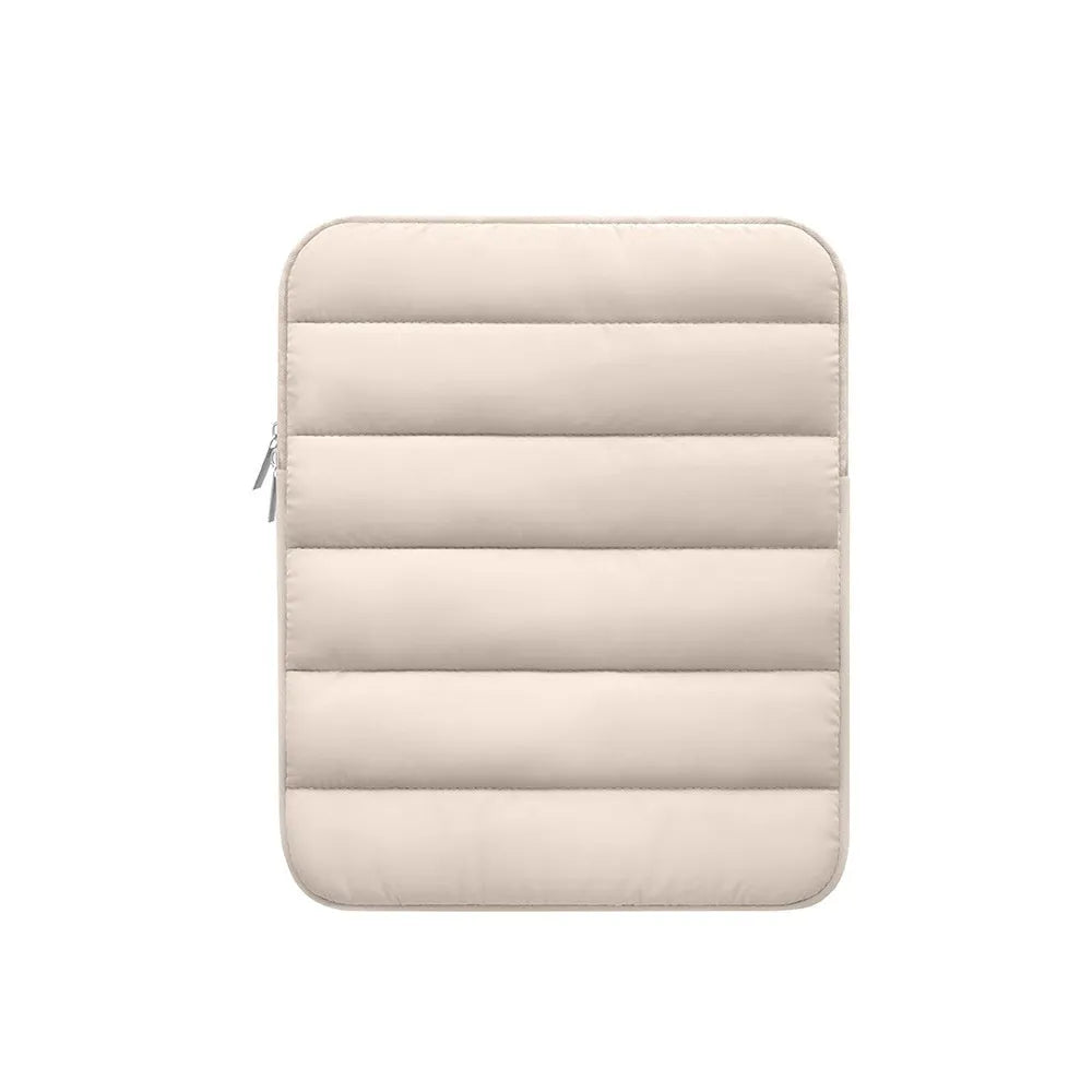 Black elastic puff bag laptop sleeve for 9.7 to 11 inch devices on a table