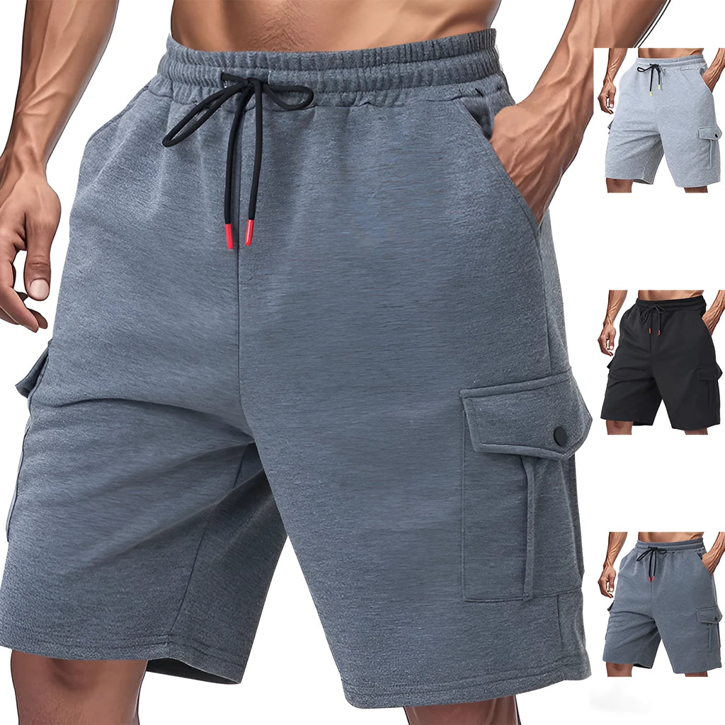 Men's light grey loose-fit terry cotton cargo shorts with multiple pockets on a plain background.