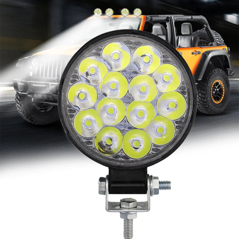 Small round white aluminium LED work light for vehicle mounting